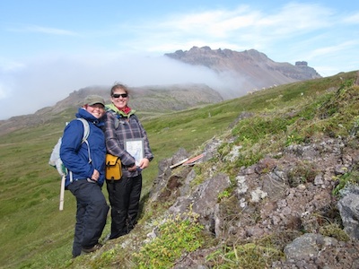 Iceland Volcanology Field Camp participants examining basaltic and rhyolitic outcrops