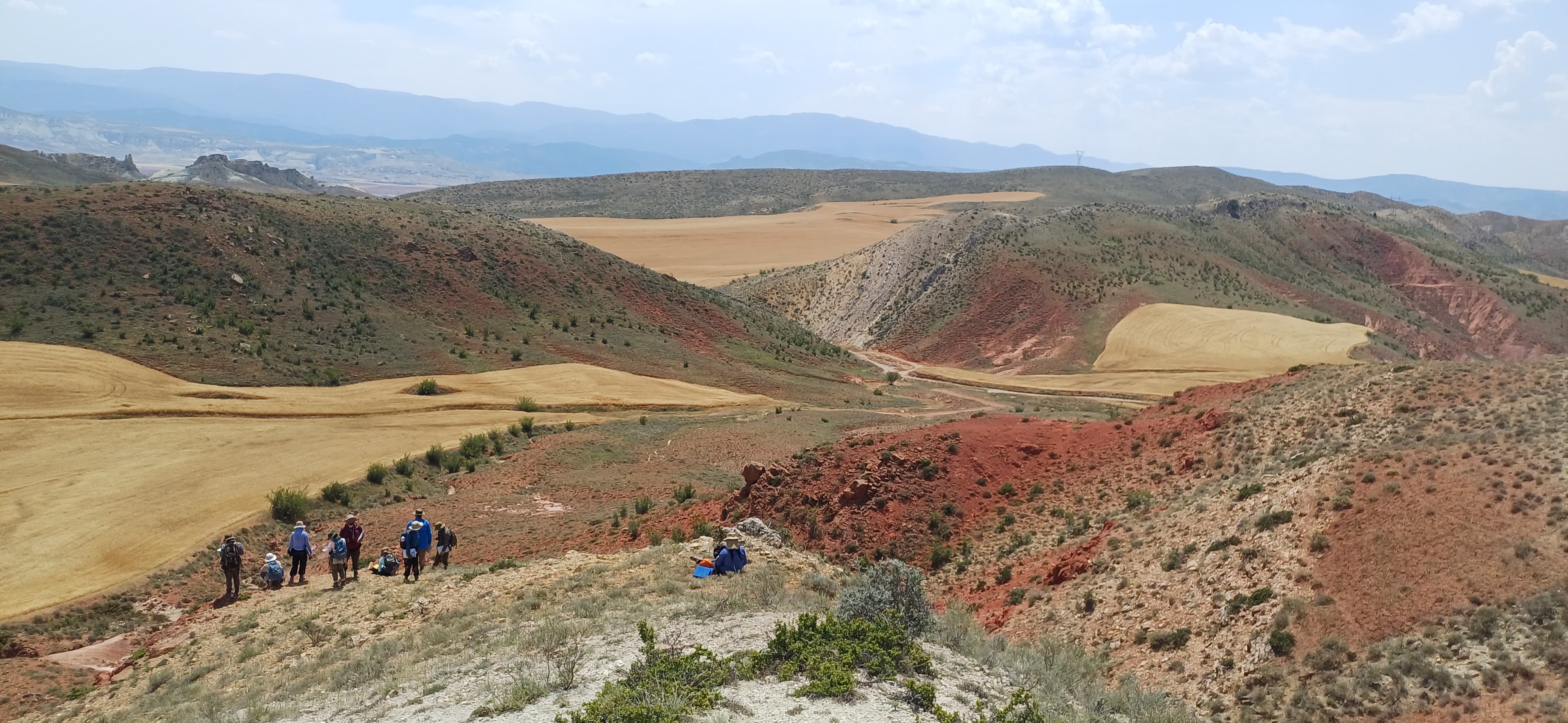 Students conducting geologic mapping in rugged terrain of western Türkiye