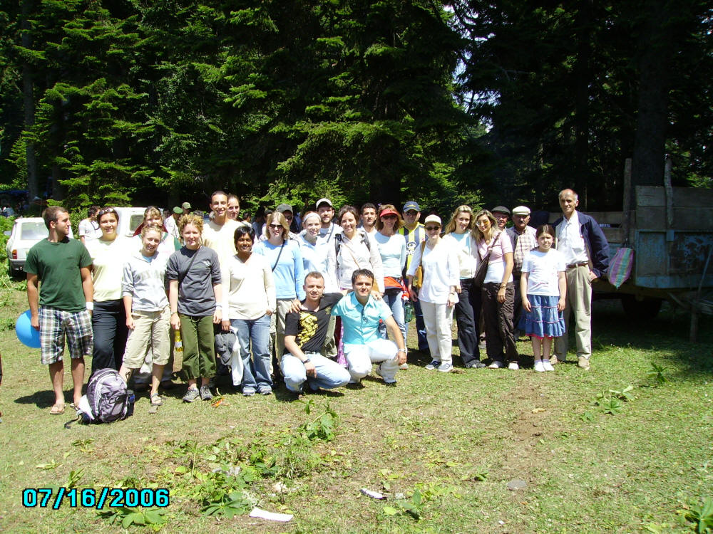 Students mapping and measuring structural data at field camp site
