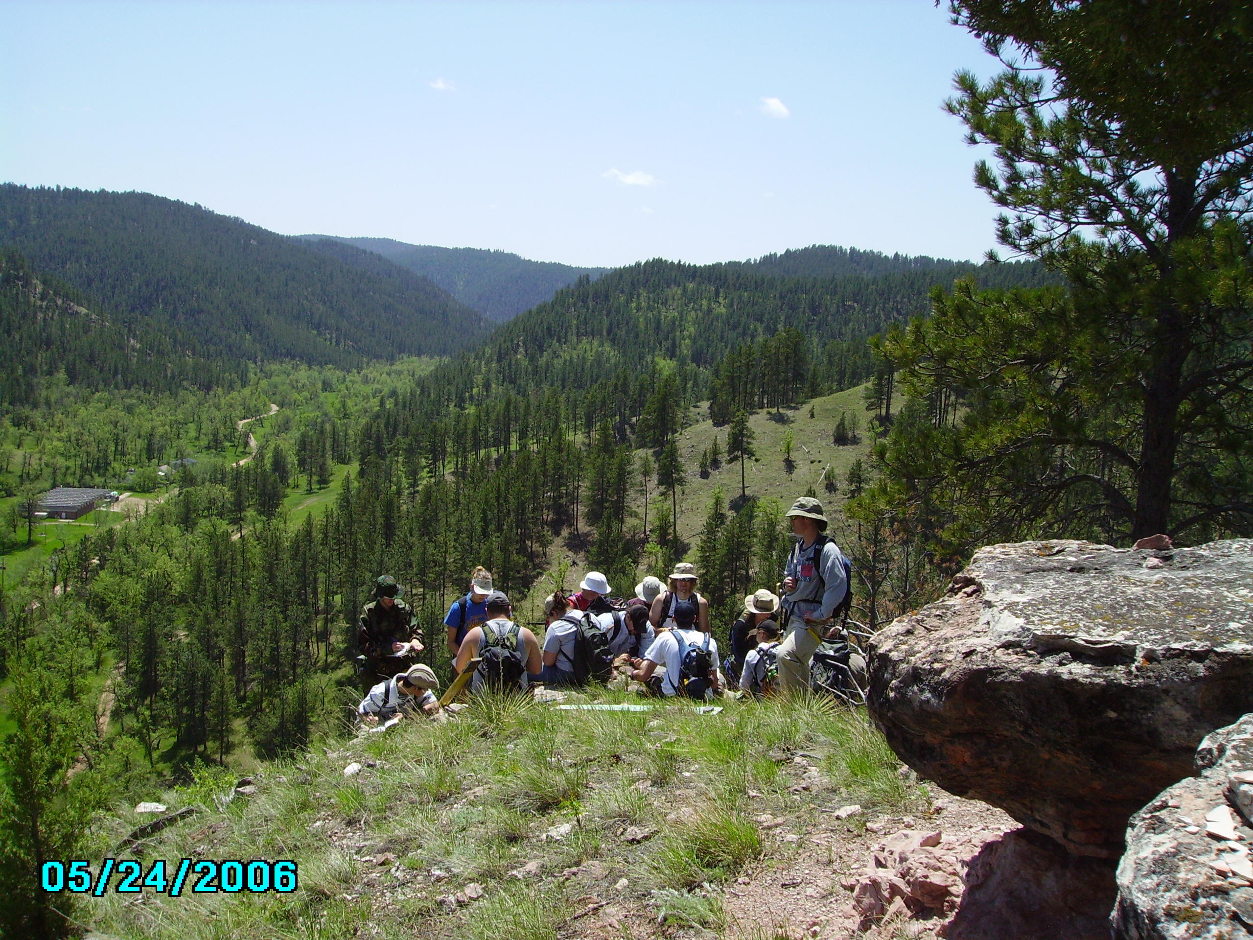 Field camp participants at a geological outcrop in the Black Hills
